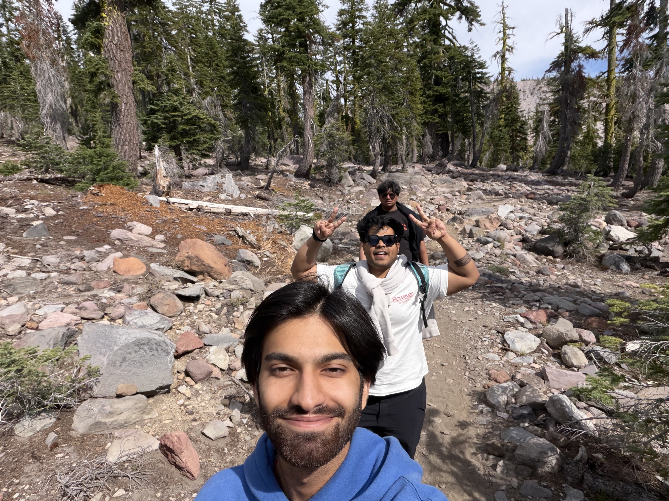 Friends on a rocky outdoor path