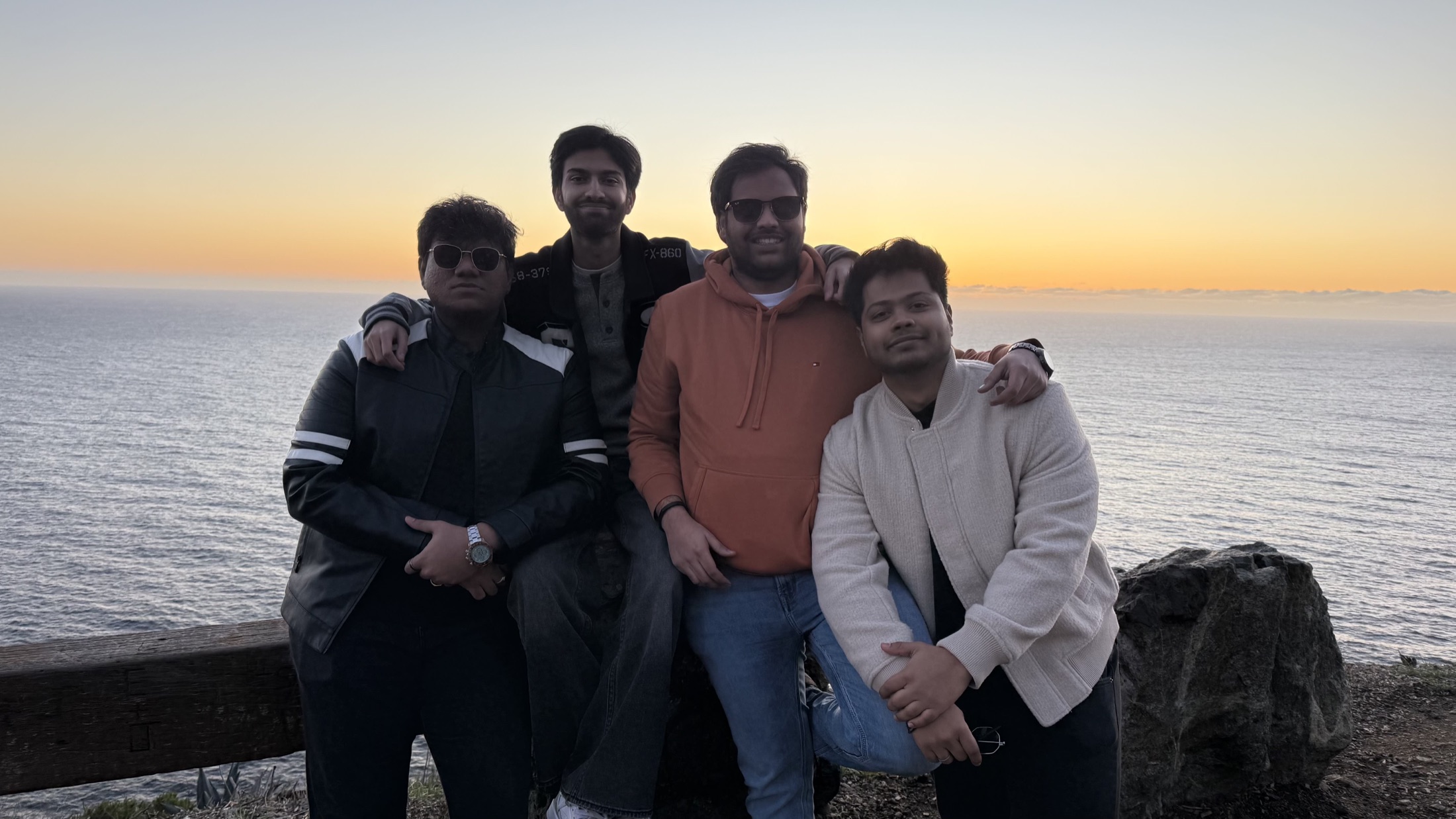 Group silhouette photo at sunset